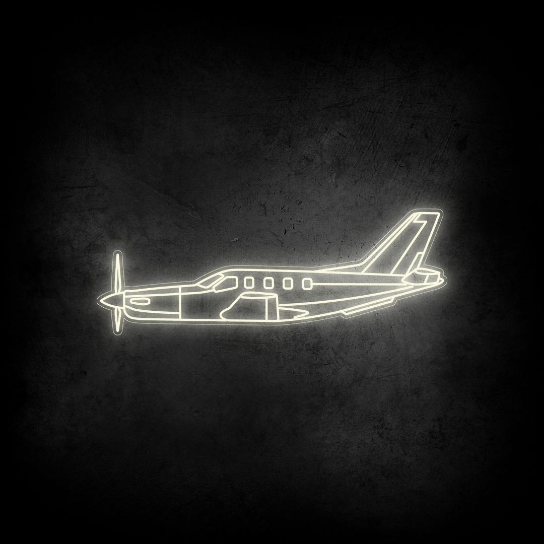 TBM 850 Neon Silhouette